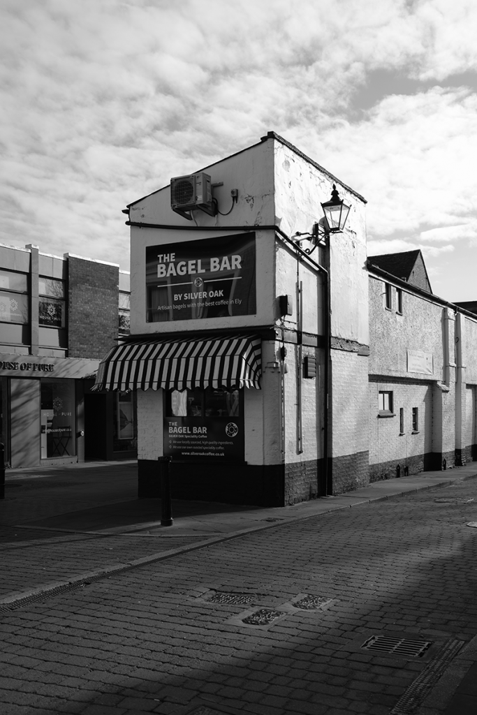 murpworkschrome - light on a lens - The Bagel Bar I BW image