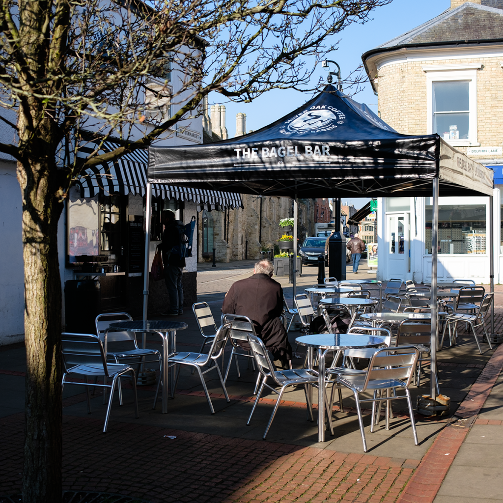 murpworkschrome - light on a lens - The Bagel Bar - in the sun image