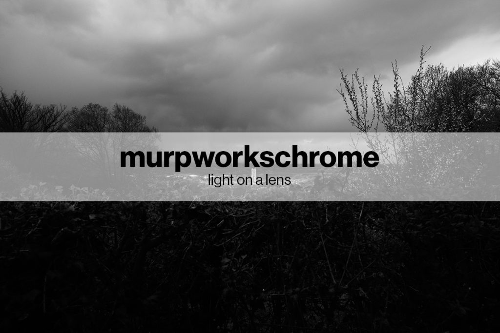murpworkschrome light on a lens black for return to blog image